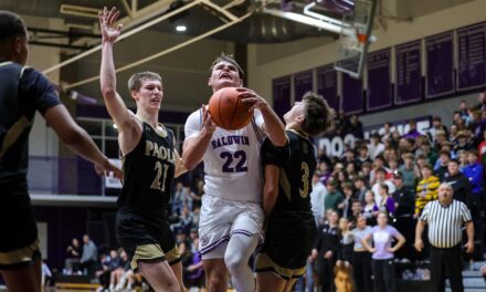 With star guard Carr sidelined, Baldwin boys upended by Paola in hoops opener