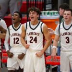 Dooley, Simien lead Lawrence boys basketball past KC East, 65-51